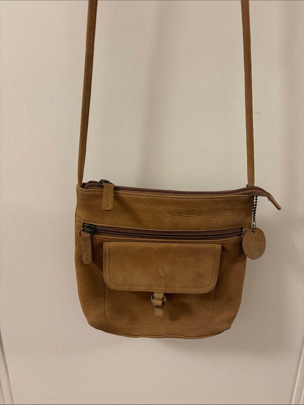 G.H. Bass & Co. tan suede leather crossbody purse.